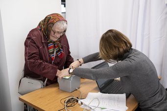 Biometric registration of an old woman, 2022 Biometric registration of an old woman, 2022