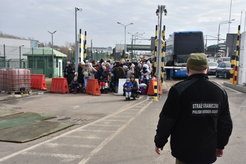 Refugees entering Poland at border crossing point Medyka